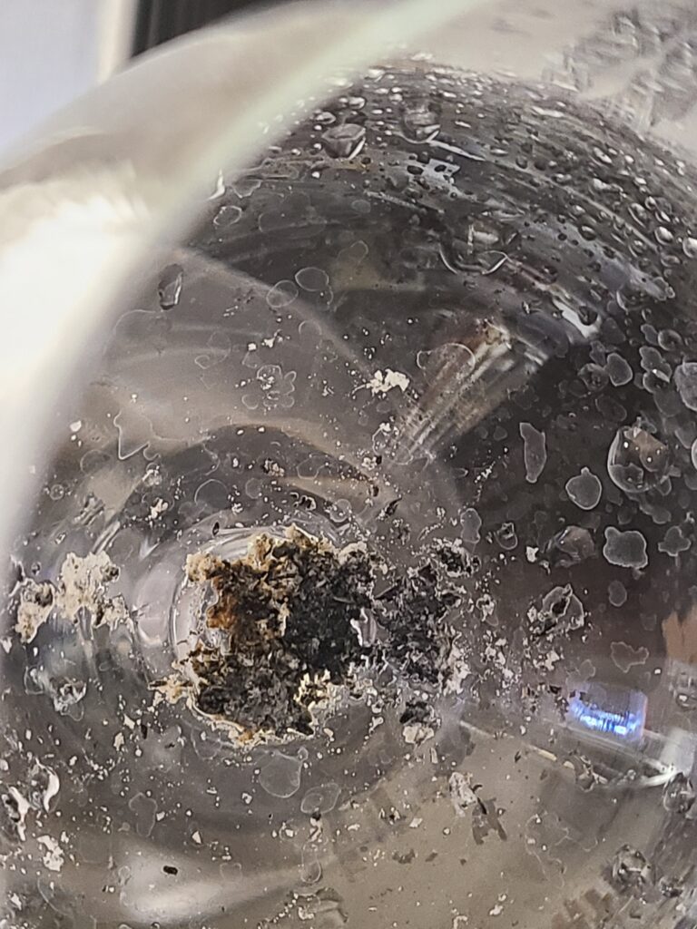 Cigarette Ashes in "Washed and Sanitized" glass delivered to bar for bartender's immediate use